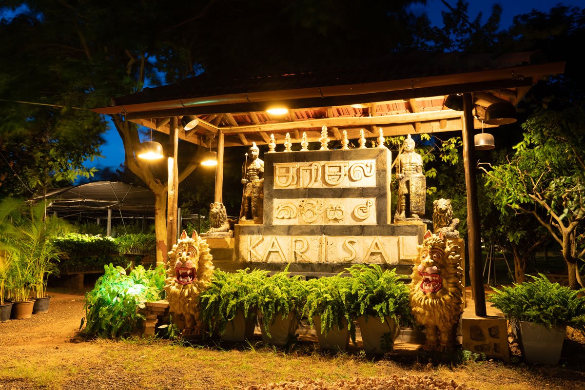 Tropical botanical garden and peaceful resort pavilion at Karisal in Jaffna